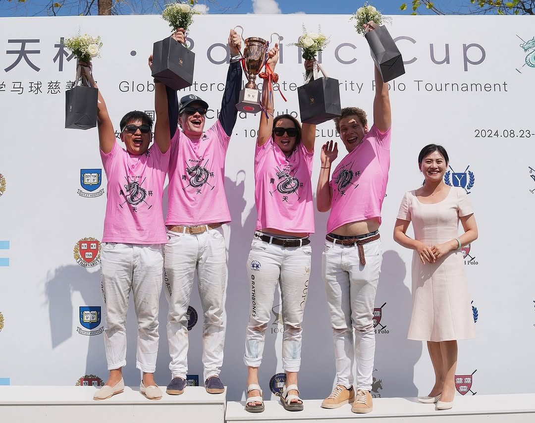 Players celebrating with a trophy